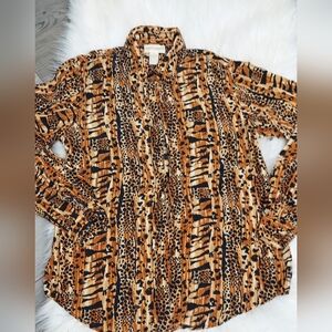 100% Silk Christie& Jill Gorgeous Animal print long sleeve blouse. Super Soft!